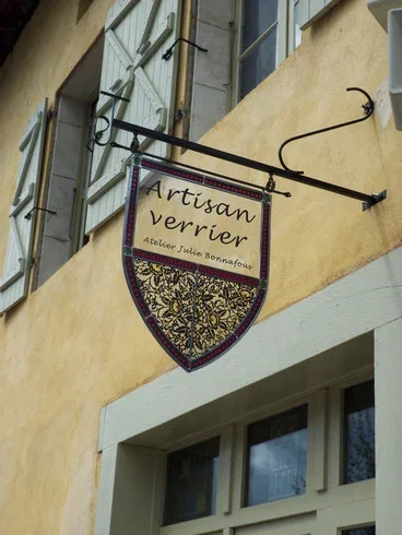 Enseigne et potence — collage ou vue du travail